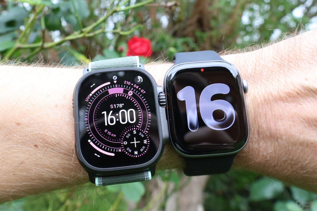 Deux Apple Watch au poignet, l'une Ultra, l'autre classique.