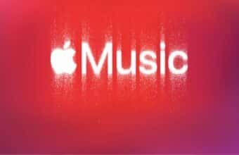 Logo Apple Music blanc avec effet de pulvérisation sur fond dégradé.