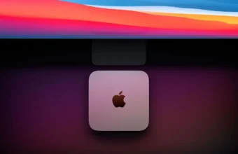Apple Mac mini under a colorful screen