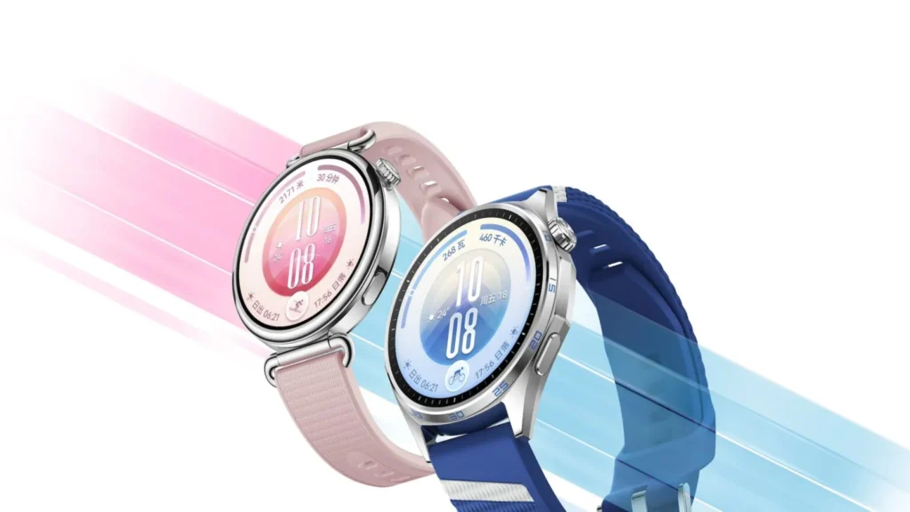 Deux montres connectées, rose et bleue, sur fond abstrait lumineux.